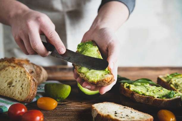 Woman cooking in the kitchen, Golden Toast toaster recipes