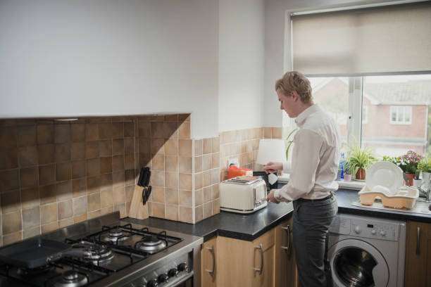 Men using toaster