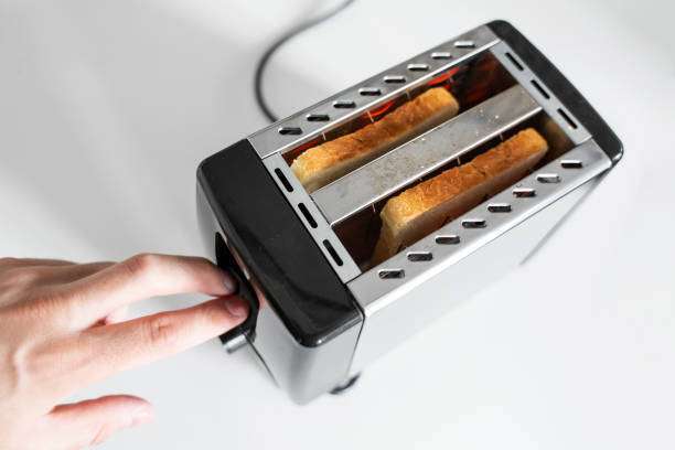 woman having breakfast, toaster
