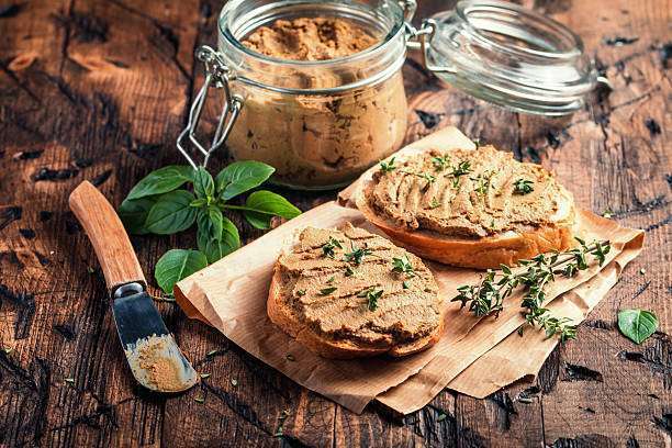Fresh homemade chicken liver pate on rustic bread. Toaster