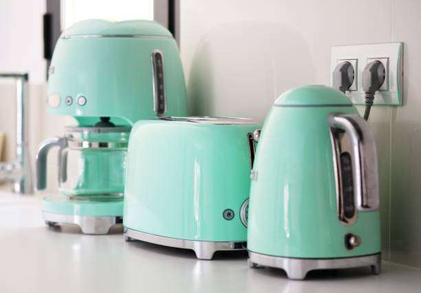 Retro mint green toaster and kettle set.