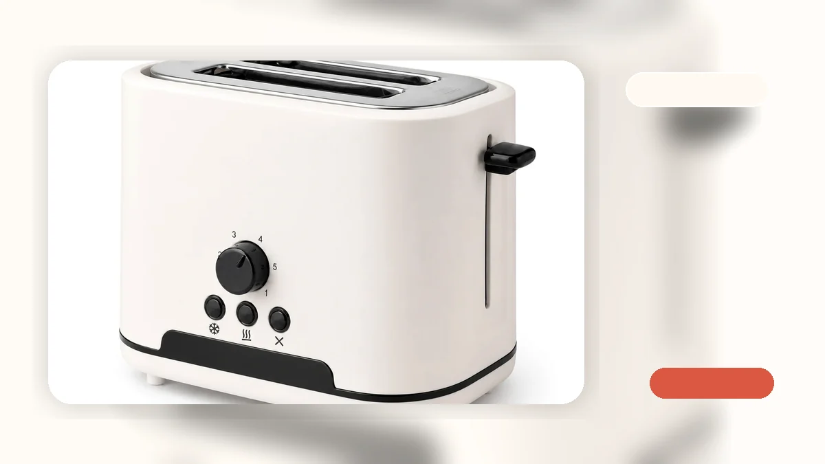 A 2-slice wide slot toaster on a kitchen counter with bagels and thick bread slices nearby