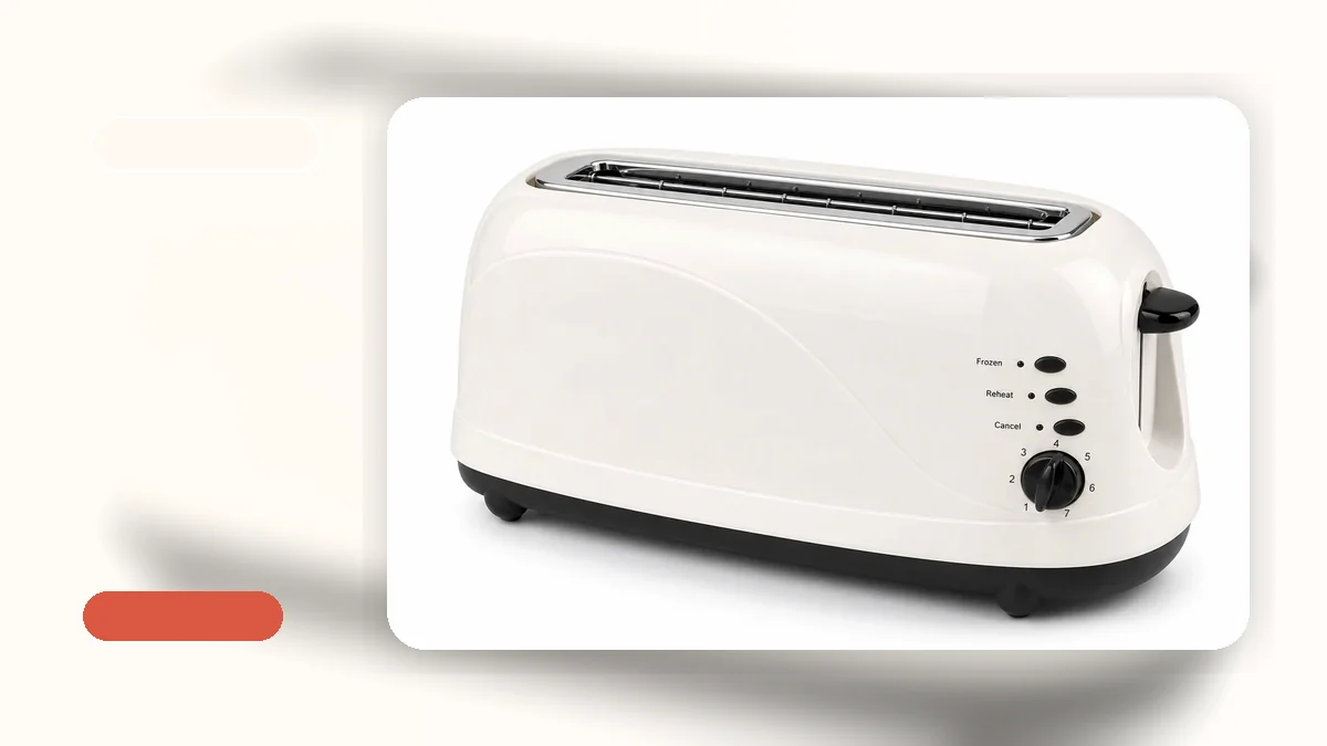 A 4-slice long slot toaster on a kitchen counter, showing its extended slots compared to a standard model.